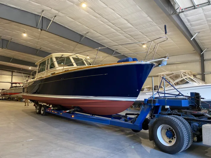 Persistence Yacht Photos Pics 2011 Sabre 40 Sedan boat on trailer in indoor storage facility.