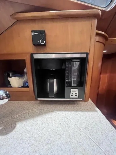 Persistence Yacht Photos Pics Built-in coffee maker in 2011 Sabre 40 Sedan yacht kitchen.