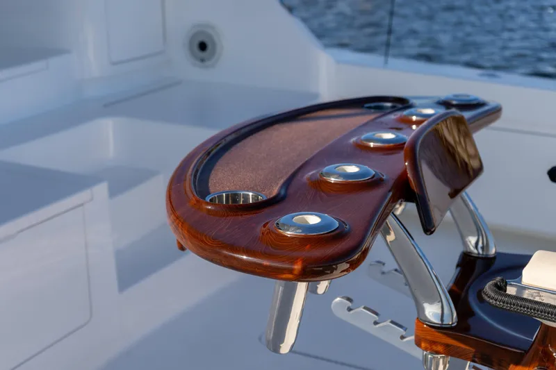 Galati Yacht Sales Trade Yacht Photos Pics Luxurious 2021 Viking 72 Enclosed Bridge yacht with polished wood and metal details.