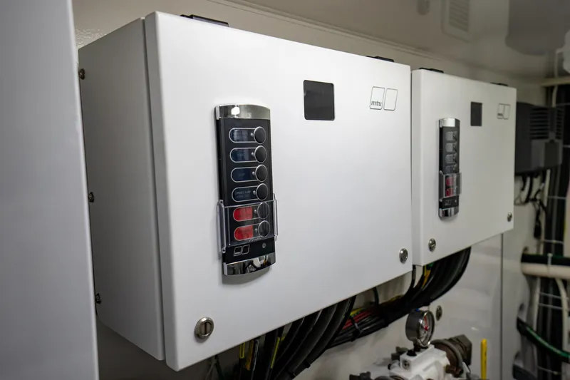 Galati Yacht Sales Trade Yacht Photos Pics Electrical control panels on a 2021 Viking 72 Enclosed Bridge yacht.