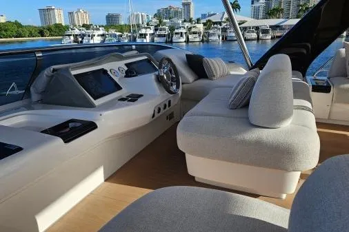 Sunlove Yacht Photos Pics Luxurious 2024 Lagoon SIXTY 7 yacht interior with modern helm and plush seating.