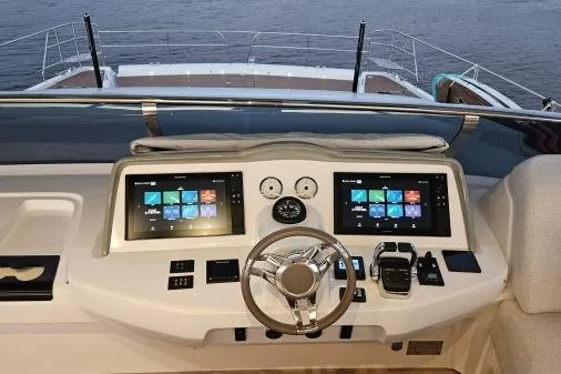 Sunlove Yacht Photos Pics 2024 Lagoon SIXTY 7 yacht helm with dual displays and modern controls.