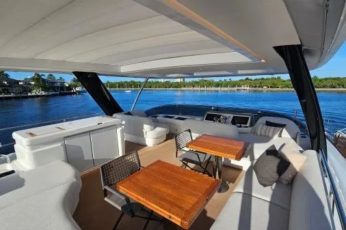 Sunlove Yacht Photos Pics Luxurious 2024 Lagoon SIXTY 7 yacht interior with elegant seating and scenic water views.