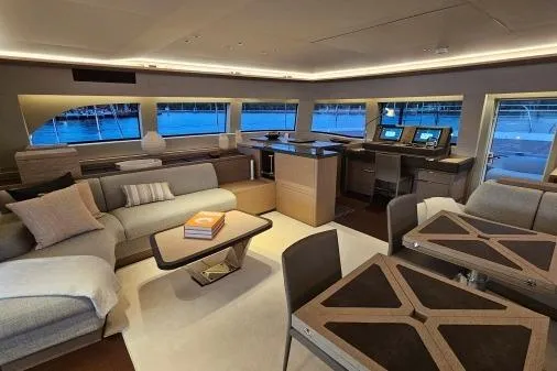 Sunlove Yacht Photos Pics Luxurious interior of 2024 Lagoon SIXTY 7 yacht with modern furnishings and panoramic windows.