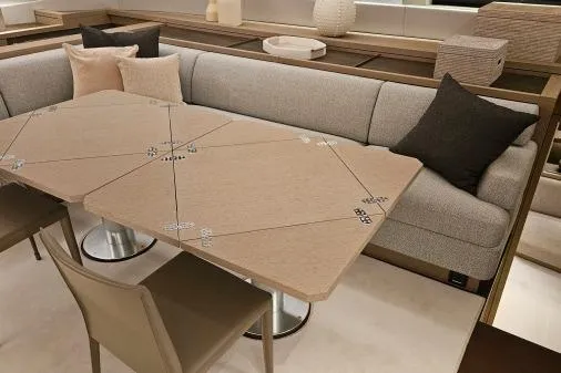 Sunlove Yacht Photos Pics Luxurious interior of 2024 Lagoon SIXTY 7 yacht with elegant seating and dining area.