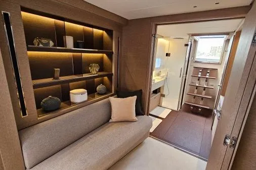 Sunlove Yacht Photos Pics Luxurious interior of 2024 Lagoon SIXTY 7 yacht with modern decor and elegant furnishings.