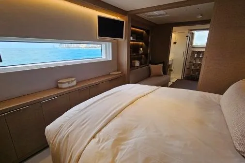Sunlove Yacht Photos Pics Luxurious interior of 2024 Lagoon SIXTY 7 yacht with ocean view and modern amenities.