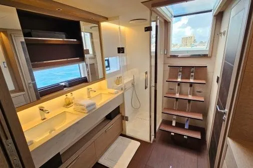 Sunlove Yacht Photos Pics Luxurious bathroom in 2024 Lagoon SIXTY 7 yacht with dual sinks and modern shower.
