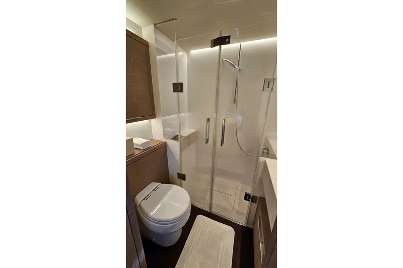 Sunlove Yacht Photos Pics Luxurious bathroom in 2024 Lagoon SIXTY 7 yacht with modern shower and toilet.