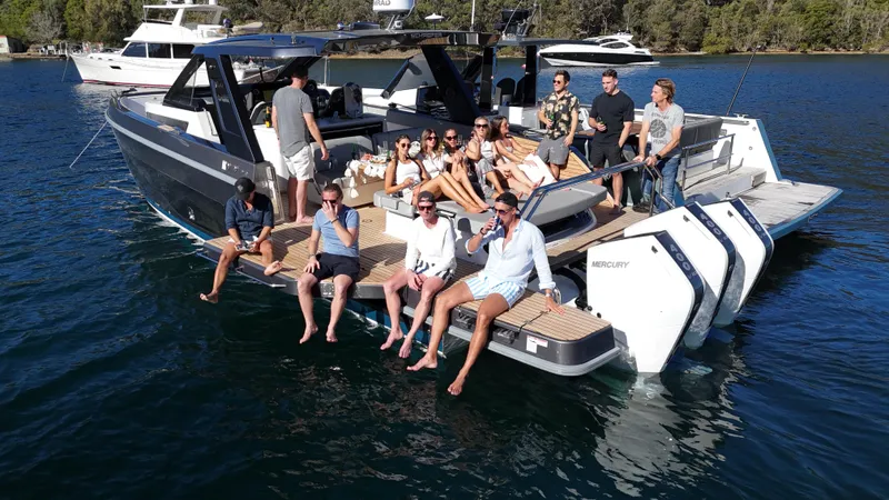  Yacht Photos Pics Group on Schaefer V44 yacht, 2024 model, enjoying sunny day on the water.