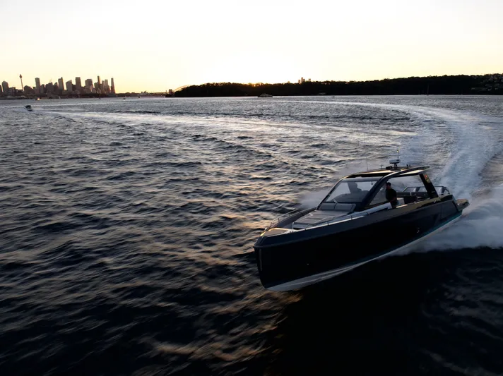  Yacht Photos Pics Schaefer V44 2024 yacht cruising at sunset on the water.