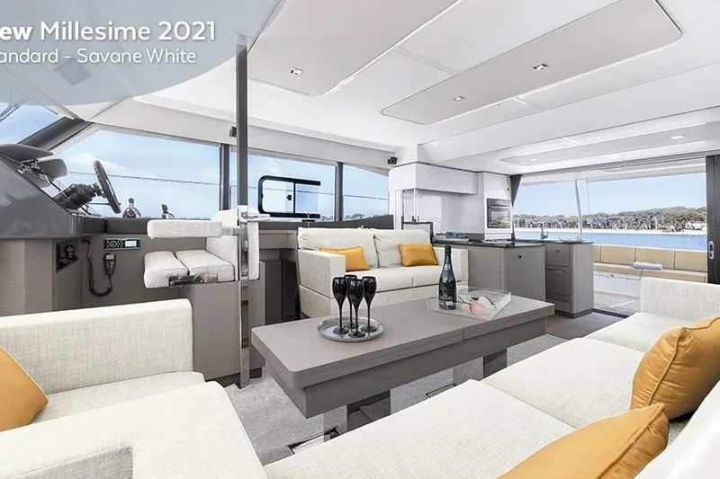  Yacht Photos Pics Luxurious interior of 2025 Fountaine Pajot MY6 yacht, featuring modern design and elegant furnishings.