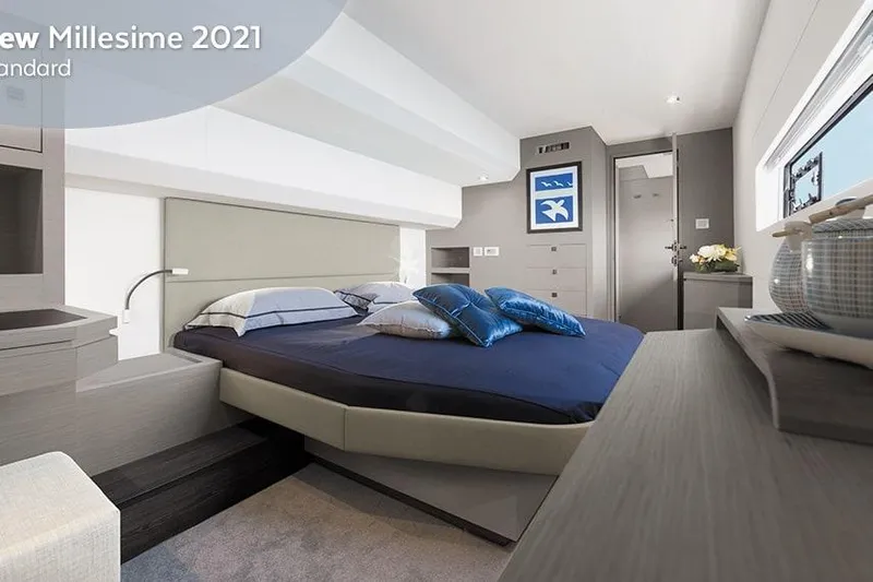  Yacht Photos Pics Luxurious bedroom interior of 2025 Fountaine Pajot MY6 yacht with modern decor.
