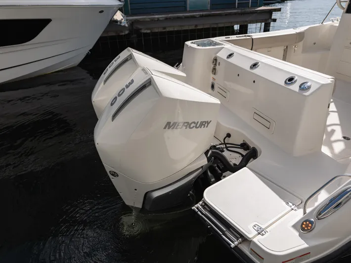  Yacht Photos Pics 2020 Boston Whaler 325 Conquest Pilothouse with twin Mercury outboard engines.
