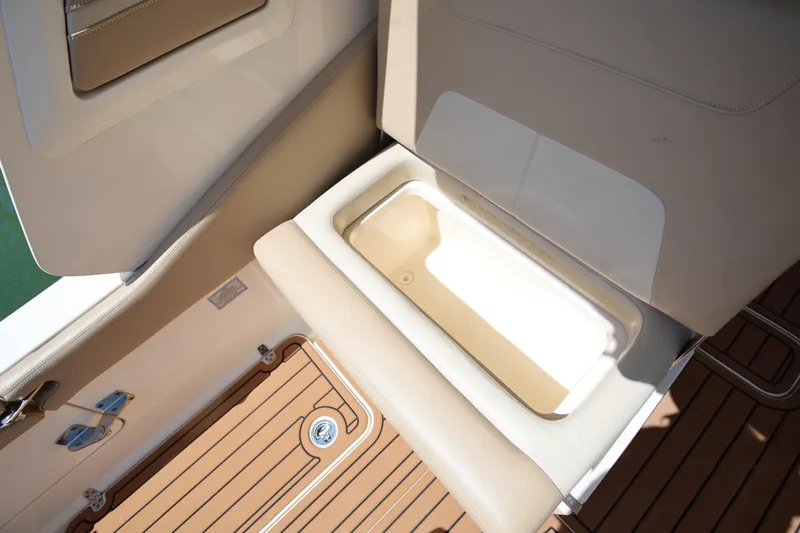  Yacht Photos Pics 2022 Scout 277 Dorado boat seat with integrated storage compartment.