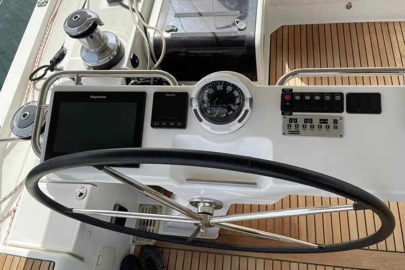  Yacht Photos Pics Cockpit of 2017 Jeanneau 64 yacht with navigation instruments and steering wheel.