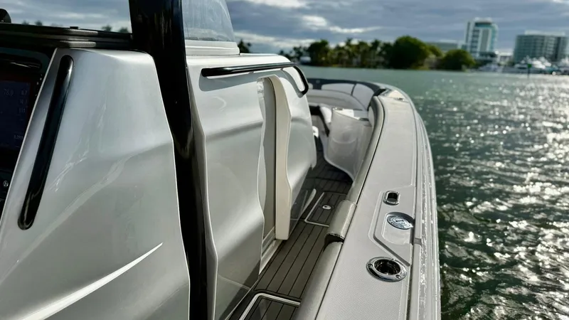  Yacht Photos Pics 2020 Fountain 43NX boat on water, sleek design, modern features, scenic background.