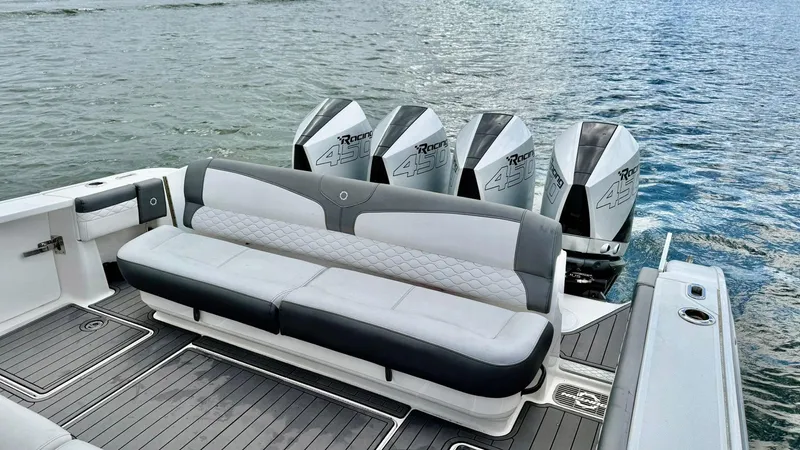  Yacht Photos Pics 2020 Fountain 43NX boat with quad engines and luxurious seating on the water.