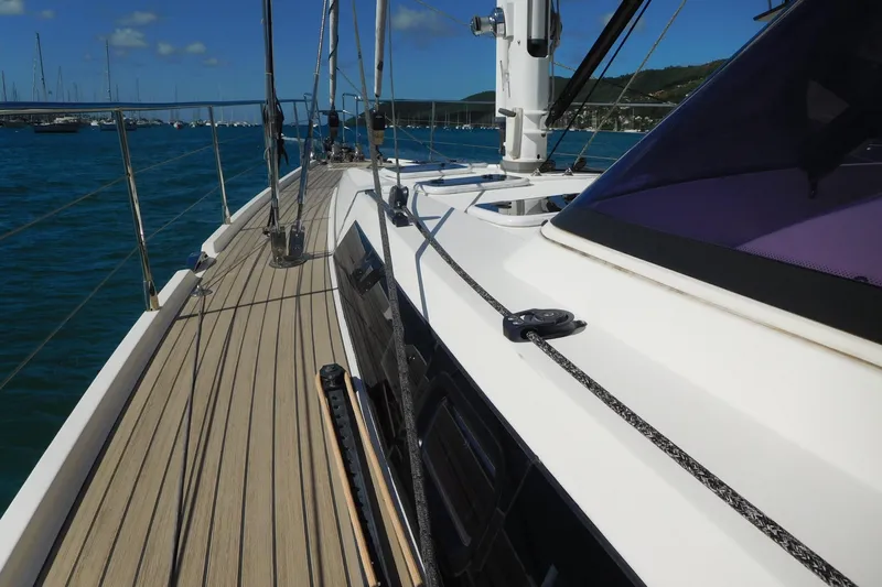  Yacht Photos Pics Sailing yacht Amel 55, 2011 model, deck view with ocean and marina background.