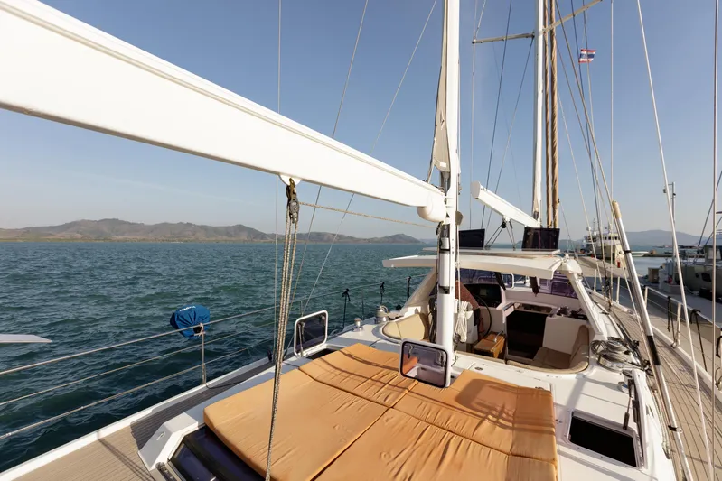  Yacht Photos Pics Sailing yacht Amel 55, 2011 model, docked with scenic ocean and mountain views.