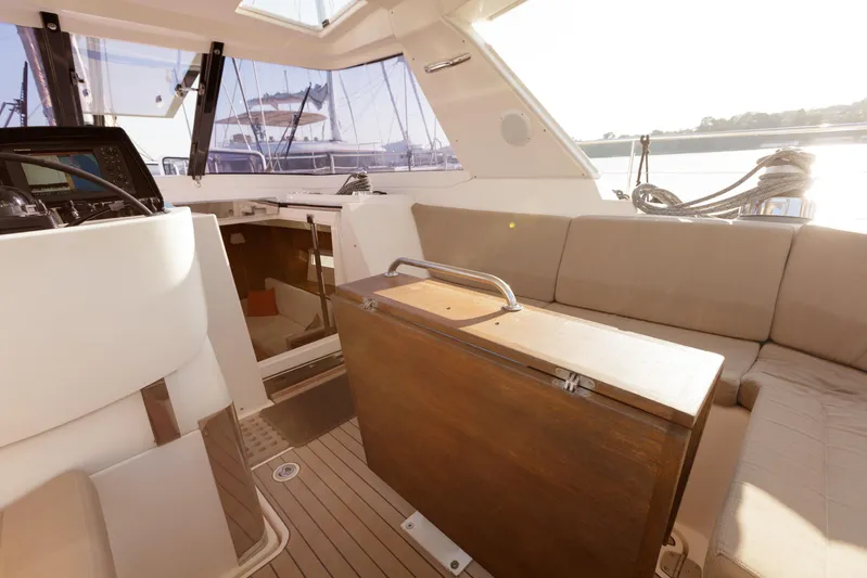  Yacht Photos Pics Interior of 2011 Amel 55 yacht with seating and navigation equipment.