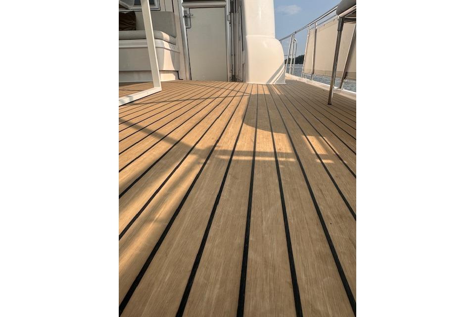Deck of 2017 Elling E4 yacht with wooden finish and sleek design.
