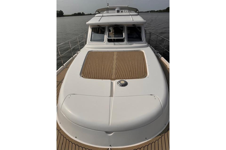 2017 Elling E4 yacht with sleek deck design on calm water.