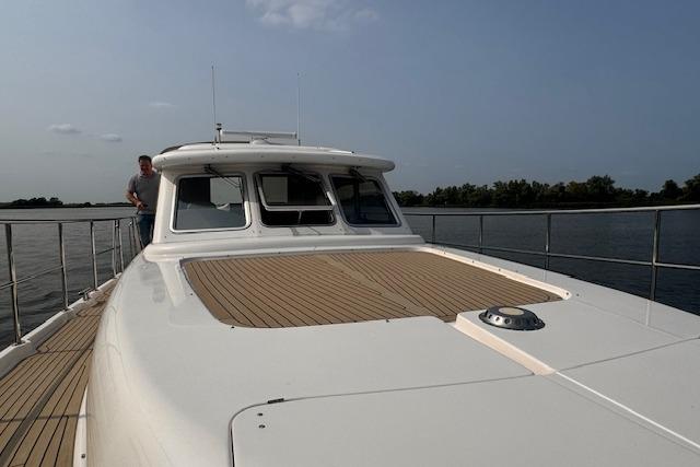 2017 Elling E4 yacht on calm water, featuring sleek design and spacious deck.