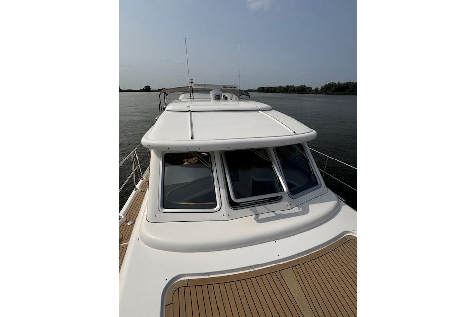 2017 Elling E4 yacht on calm water, showcasing sleek design and spacious deck.