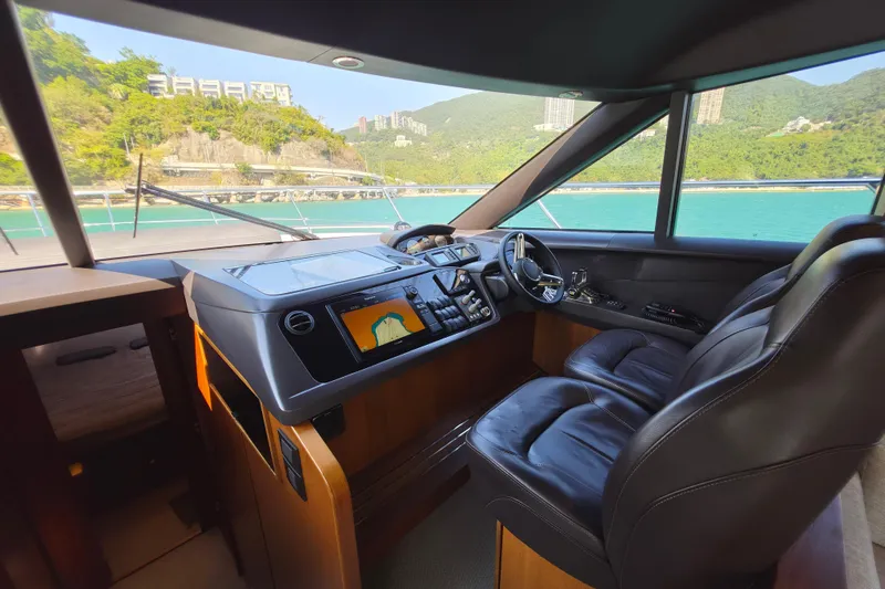  Yacht Photos Pics Luxurious 2017 Princess 52 yacht cockpit with leather seats and navigation system.