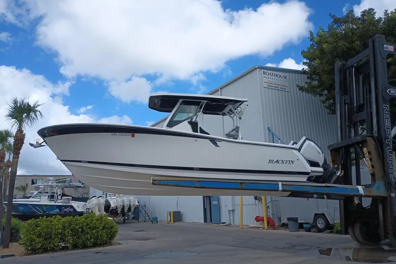  Yacht Photos Pics 2020 Blackfin 272 CC boat on forklift at Boathouse Marine Center.