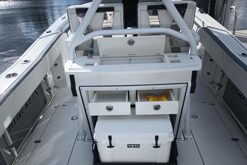  Yacht Photos Pics 2020 Blackfin 272 CC boat interior with storage drawers and Yeti cooler.