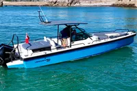 2020 Axopar 28 T-Top boat on clear blue water, featuring sleek design and modern amenities.