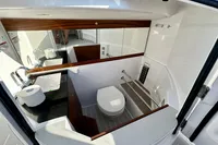 2020 Axopar 28 T-Top boat interior with modern bathroom amenities.