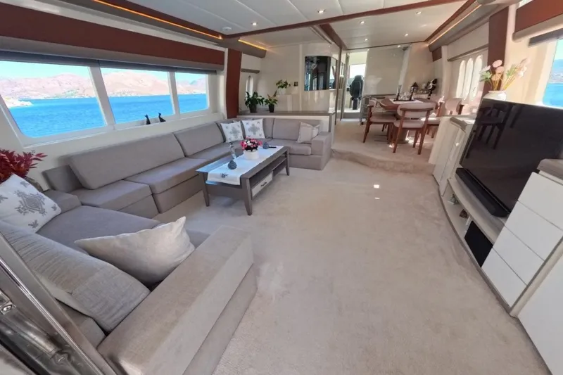  Yacht Photos Pics Luxurious interior of 2005 Princess 25M yacht with elegant seating and sea view.