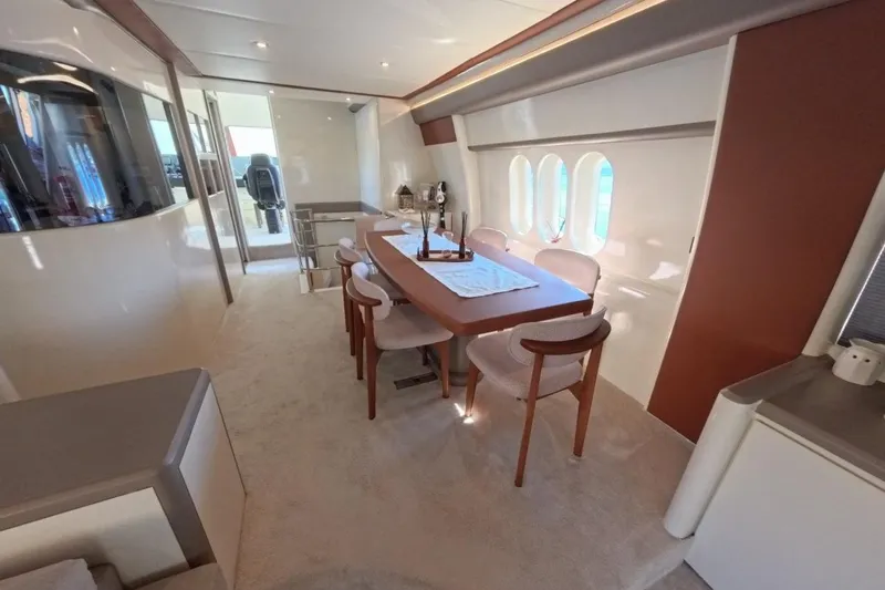  Yacht Photos Pics Luxurious interior of a 2005 Princess 25M yacht with elegant dining area.