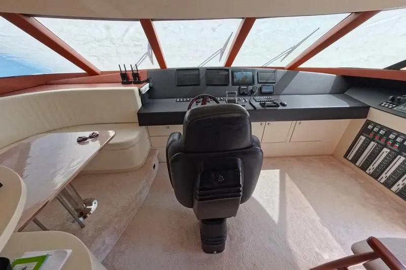  Yacht Photos Pics Luxurious helm of a 2005 Princess 25M yacht with modern navigation equipment.