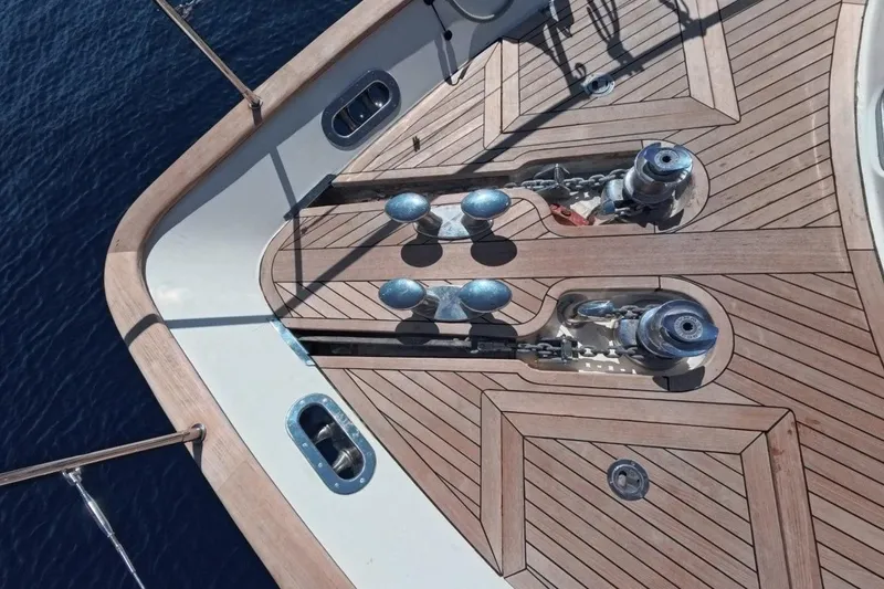  Yacht Photos Pics Deck of 2005 Princess 25M yacht with wooden finish and anchor winches.