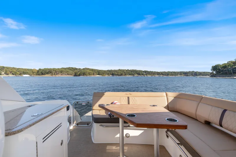  Yacht Photos Pics 2017 Sea Ray Sundancer 350 yacht with scenic lake view and comfortable seating area.