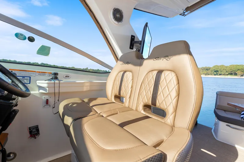  Yacht Photos Pics Luxurious interior of 2017 Sea Ray Sundancer 350 boat with tan leather seating.