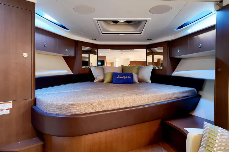  Yacht Photos Pics Luxurious interior cabin of 2017 Sea Ray Sundancer 350 yacht with cozy bedding.