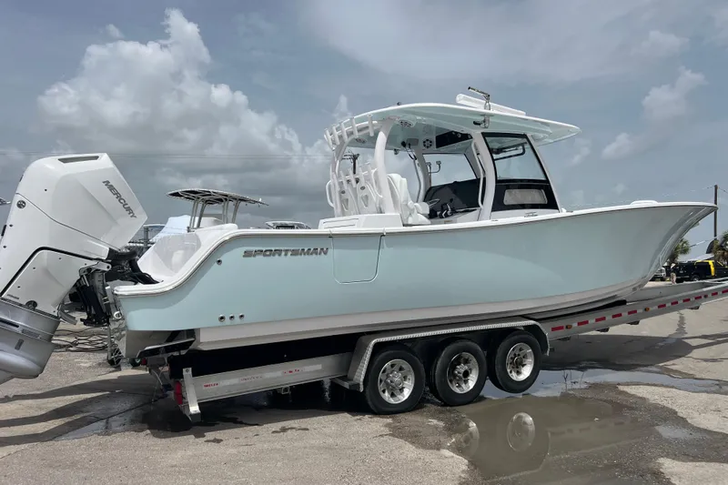 Yacht Photos Pics 2026 Sportsman Open 352 Center Console boat on trailer, featuring Mercury outboard engines.