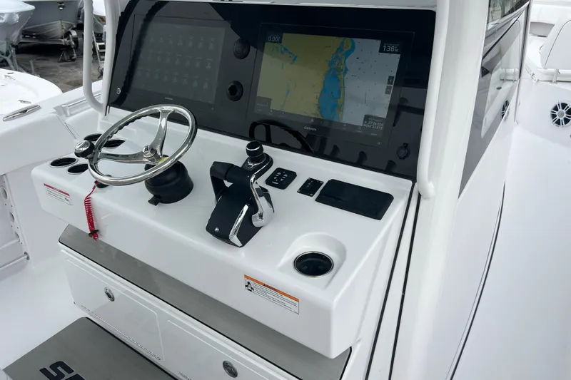  Yacht Photos Pics 2026 Sportsman Open 352 Center Console dashboard with steering wheel and navigation display.