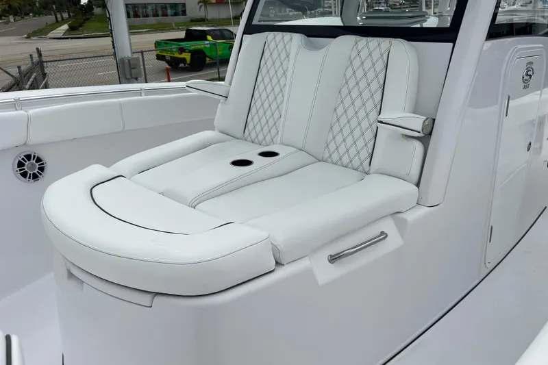  Yacht Photos Pics Luxurious seating on 2026 Sportsman Open 352 Center Console boat, featuring white upholstery.