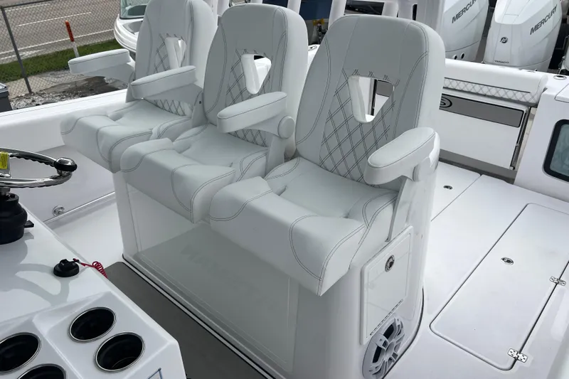  Yacht Photos Pics 2026 Sportsman Open 352 Center Console with luxurious white seating and modern design.