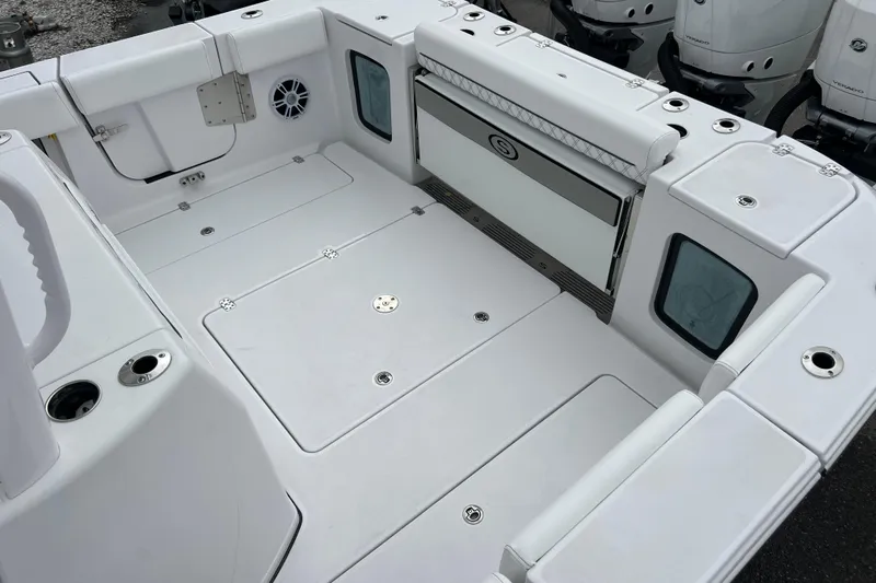  Yacht Photos Pics 2026 Sportsman Open 352 Center Console boat deck with storage compartments and seating.