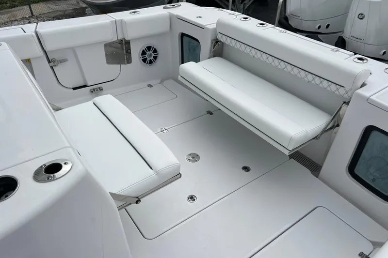  Yacht Photos Pics 2026 Sportsman Open 352 Center Console boat interior with white seating and modern design.