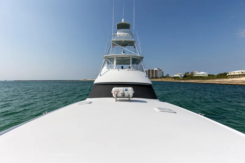  Yacht Photos Pics 2003 Hatteras 60 Convertible yacht on open water.