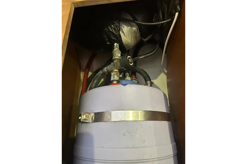  Yacht Photos Pics Water heater system inside 2013 Beneteau Oceanis 37 yacht compartment.