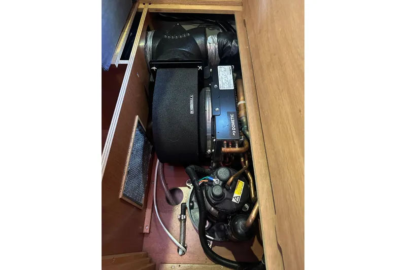  Yacht Photos Pics Engine compartment of a 2013 Beneteau Oceanis 37 sailboat, featuring Dometic equipment.